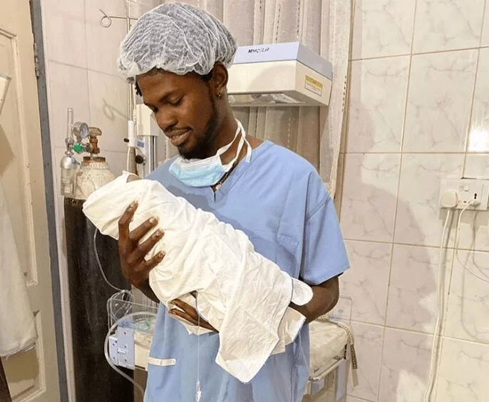 Fameye shares photo of when he first saw his son Fameye shares photo of when he first saw his son